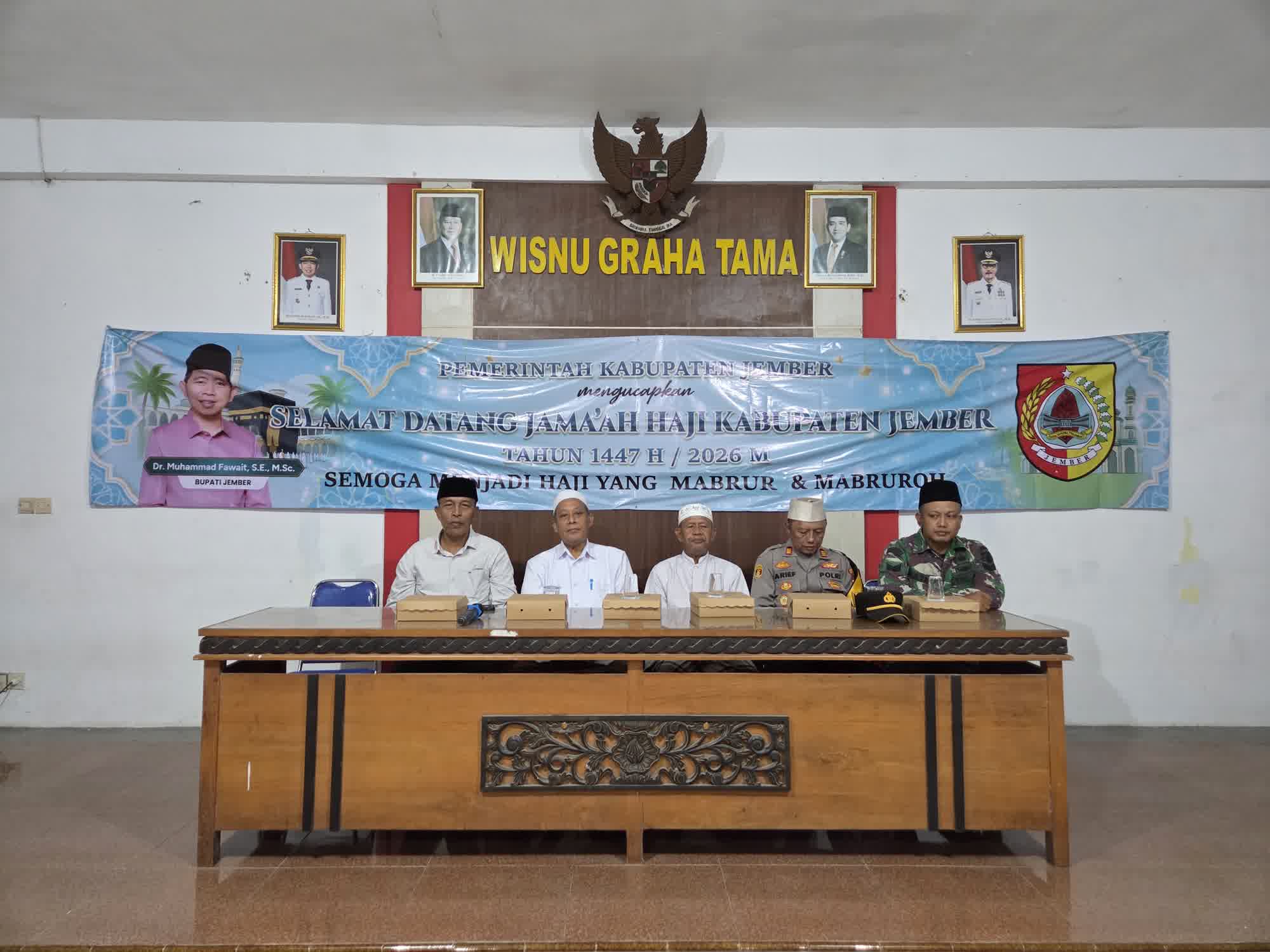 sinergi-forkopimcam-ambulu-sukses-sambut-kepulangan-jemaah-haji-kloter-92-20260627